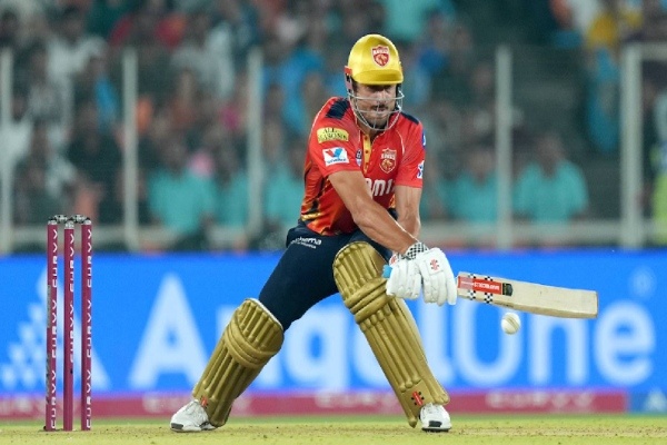 Marcus Stoinis of PBKS plays a shot