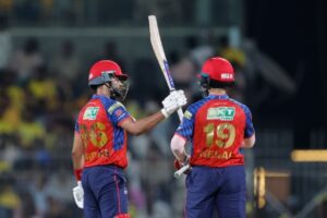 Shreyas Iyer reacts after scoring a fifty with Nehal Wadhera
