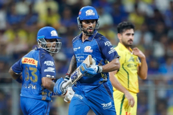 Mumbai Indians in action against Chennai Super Kings