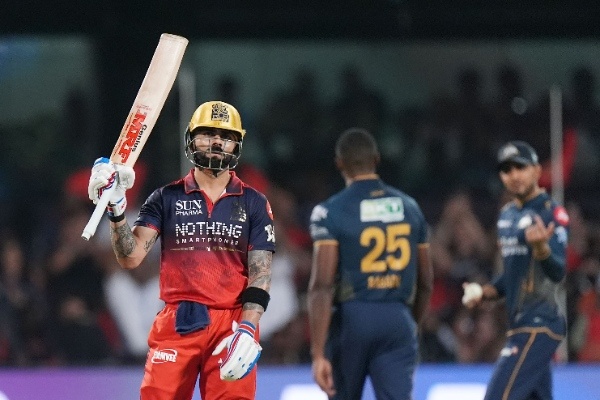 Virat Kohli celebrates a fifty