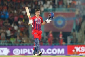 Mitchell Marsh celebrates a century