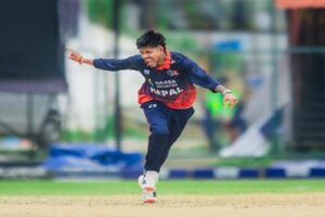 Sandeep Lamichhane celebrates
