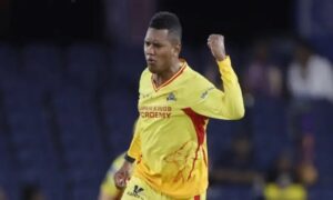 Akeal Hosein celebrates