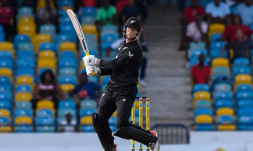 Mitchell Santner plays a shot
