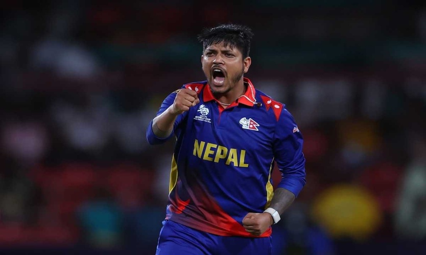 Sandeep Lamichhane celebrates